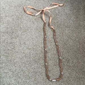 J Crew decorative necklace with Peach barrel bead and rhinestone circles